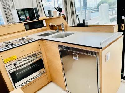 Galley of One Ibiza Crewed, a Excess 11 catamaran at Ibiza, Spain