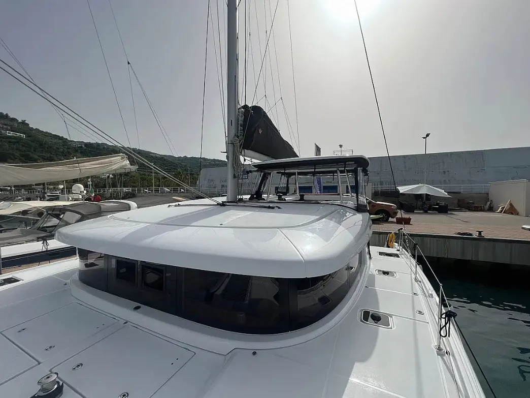 Exterior view of Capovento, a Lagoon 42 catamaran at Capo d'Orlando, Italy