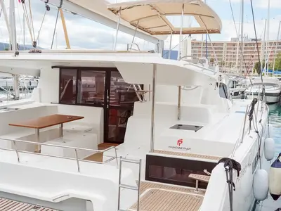 Deck of Harley Quinn, a Fountaine Pajot Astrea 42 catamaran at Tonnarella, Italy