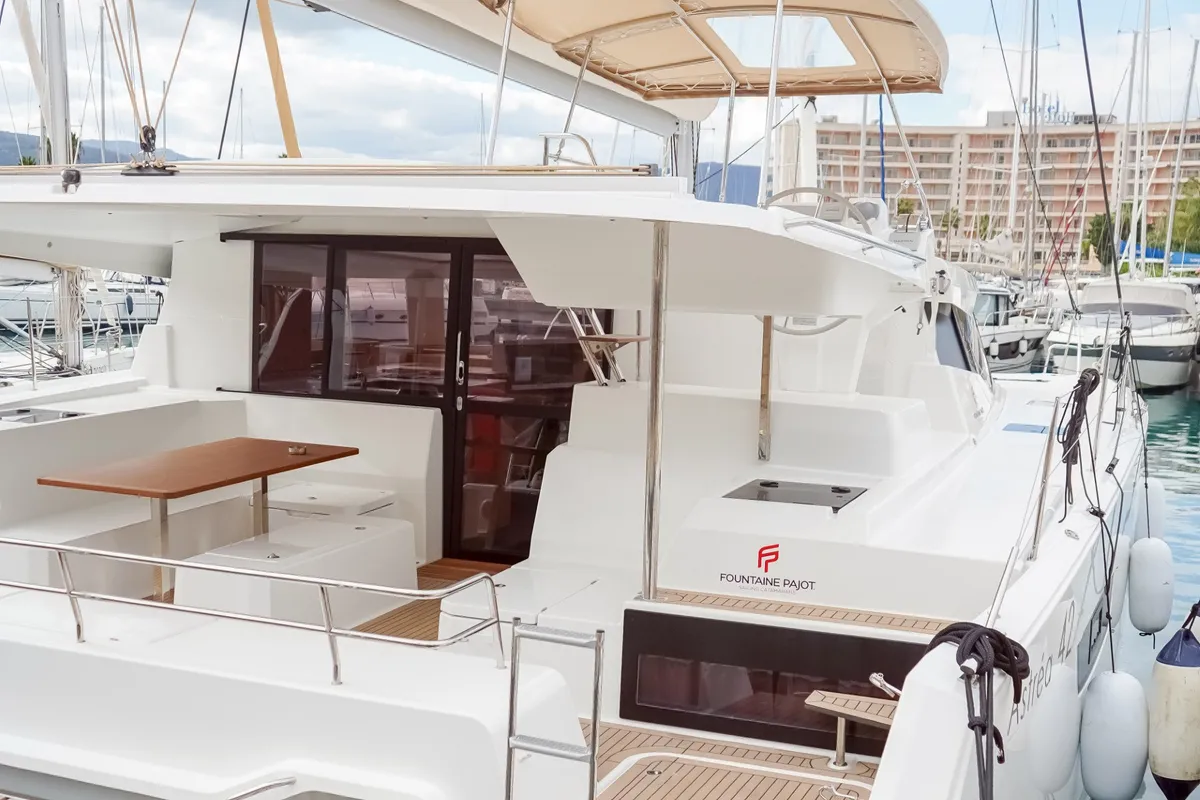 Deck of Harley Quinn, a Fountaine Pajot Astrea 42 catamaran at Tonnarella, Italy