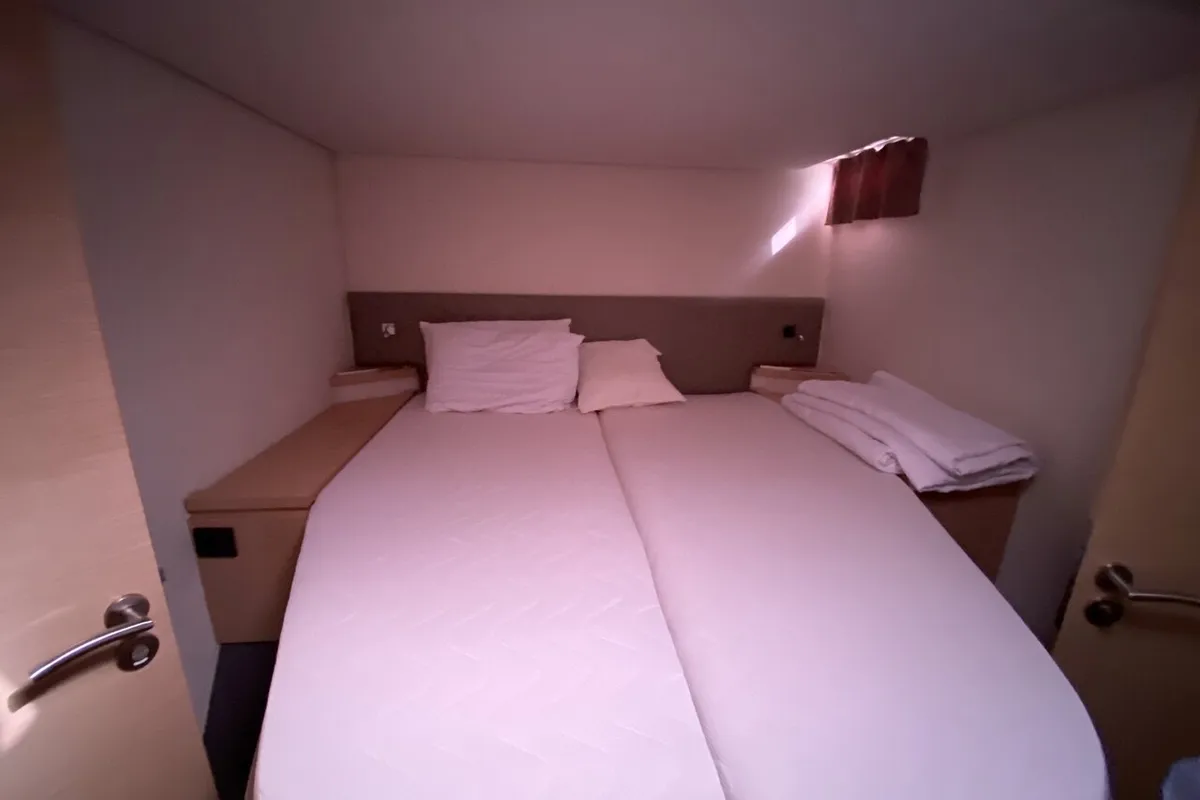 Cabin on Sunshine Reggae, a Fountaine Pajot Saba 50 catamaran at Palma de Mallorca, Spain