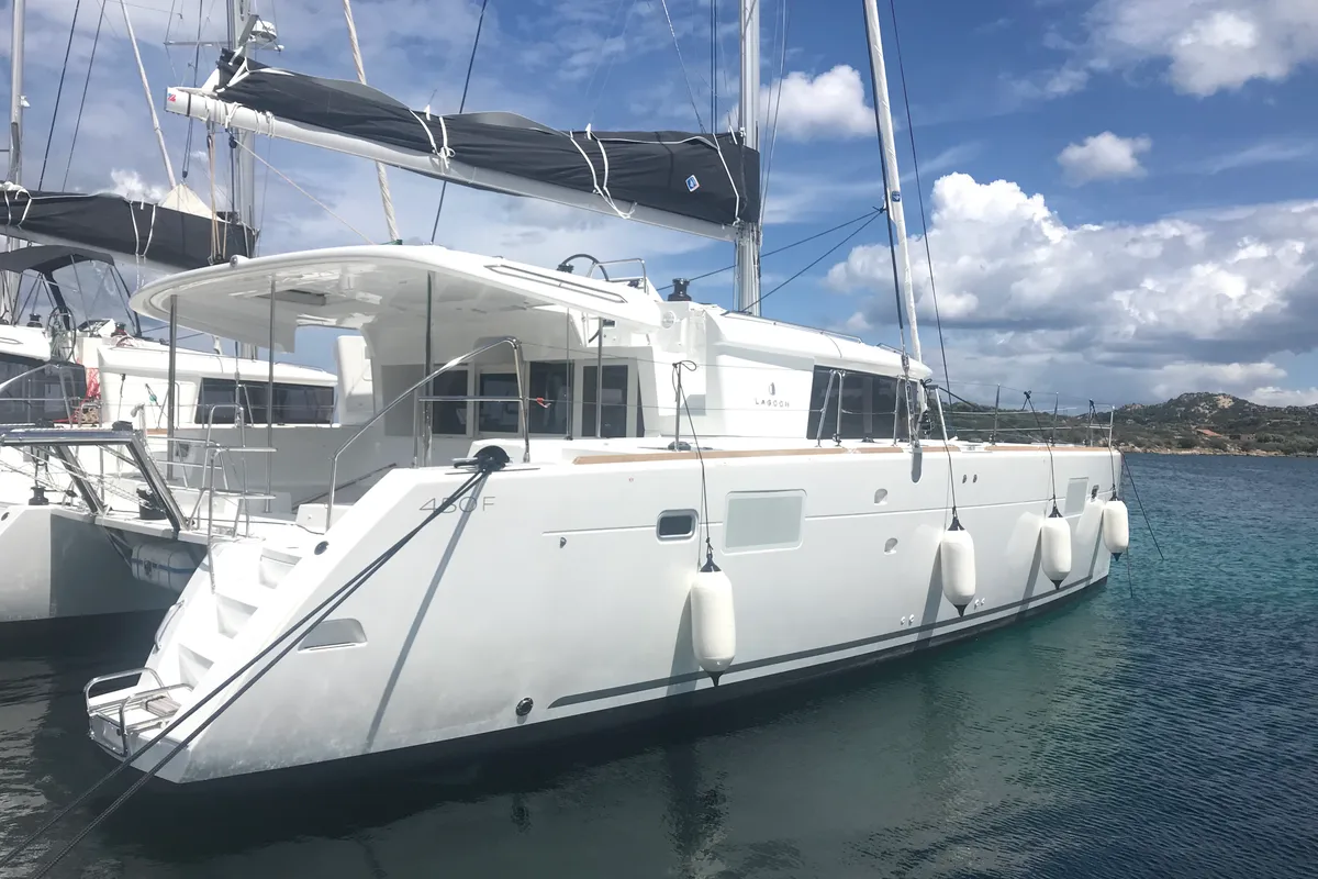 Exterior view of Cor Caroli, a Lagoon 450 Fly catamaran at Rosignano Solvay, Italy