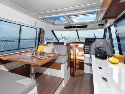 Salon of Hera II, a Jeanneau Merry Fisher 1095 motorboat at Bacoli, Italy