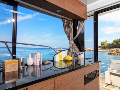Galley of Hera II, a Jeanneau Merry Fisher 1095 motorboat at Bacoli, Italy