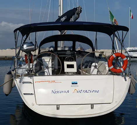 Exterior view of Nessuna Distrazione, a Bavaria Cruiser 41 sailboat at Procida, Italy