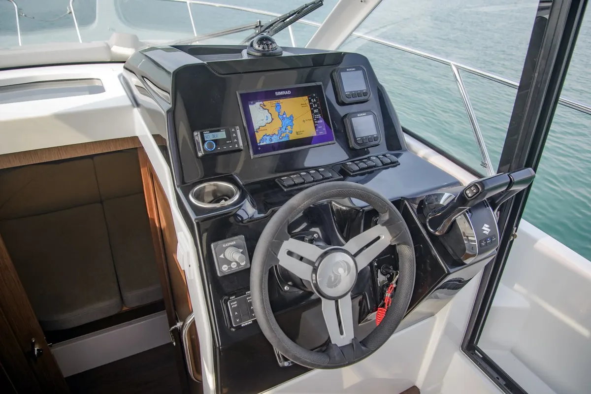 Cockpit of Beneteau Antares 9 OB, a motorboat at Pula, Croatia