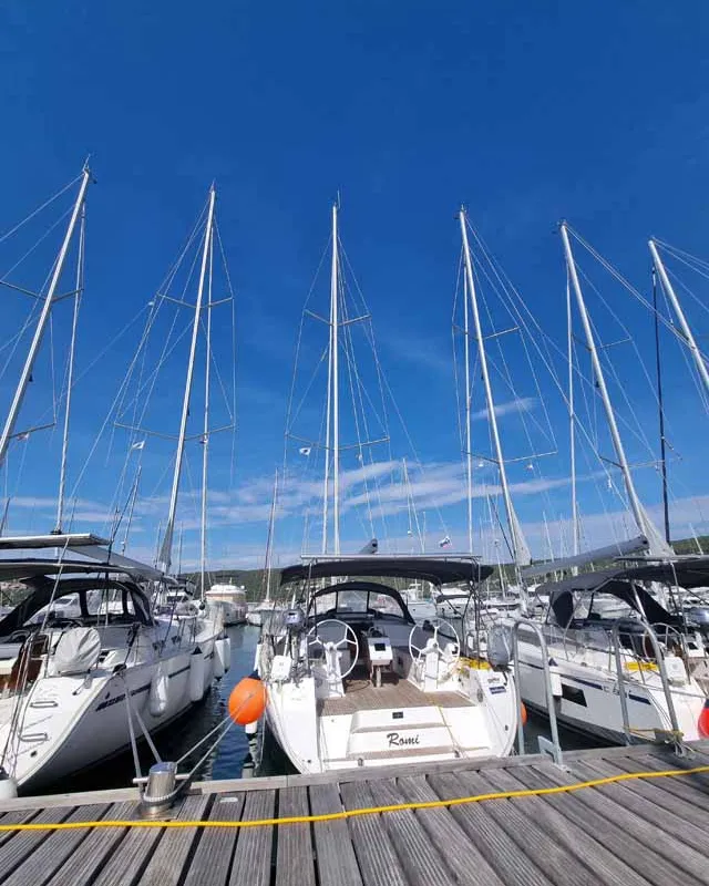 Exterior view of Romi, a Bavaria Cruiser 46 sailboat at Punat, Croatia