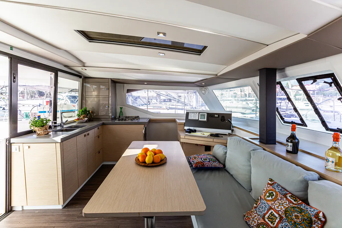 Salon of Relax Planet, a Fountaine Pajot Lucia 40 catamaran at Tonnarella, Italy