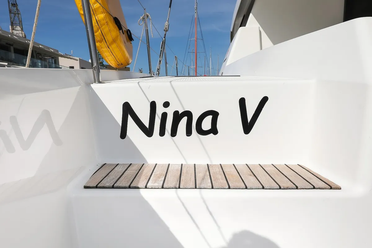 Exterior view of Nina V, a Fountaine Pajot Saona 47 Quintet catamaran at Grad Trogir, Croatia