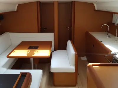 Salon of Pata, a Jeanneau Sun Odyssey 519 sailboat at Cannigione, Italy