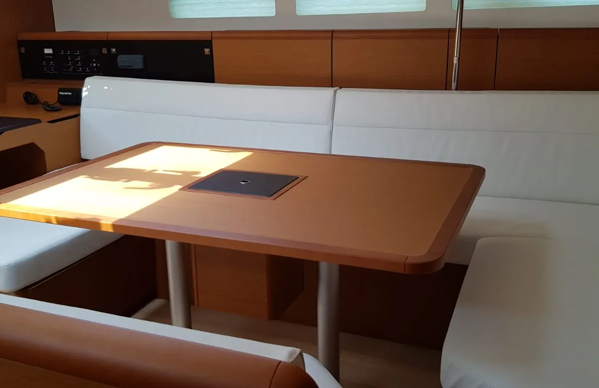 Salon of Pata, a Jeanneau Sun Odyssey 519 sailboat at Cannigione, Italy