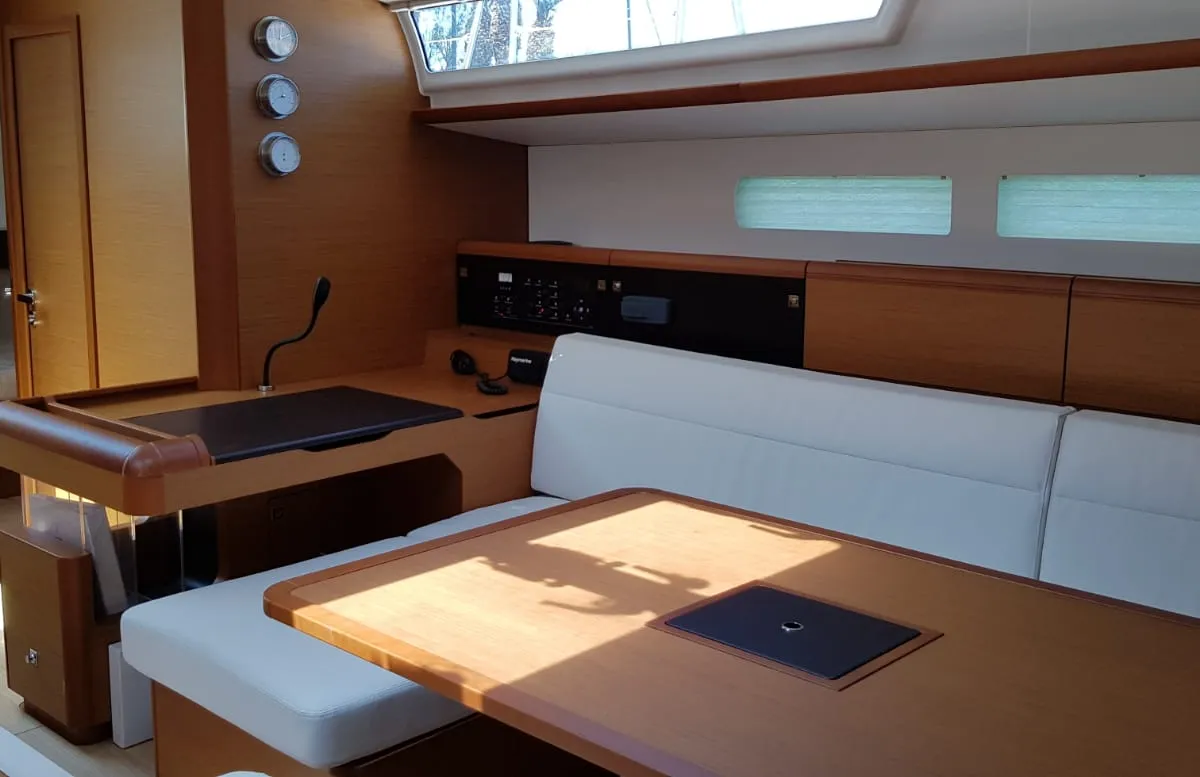 Salon of Pata, a Jeanneau Sun Odyssey 519 sailboat at Cannigione, Italy