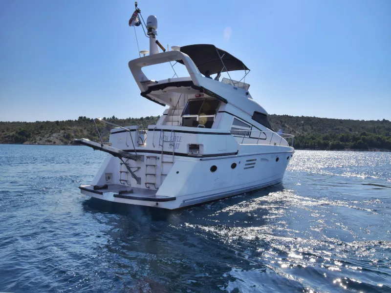 Exterior view of New Style , a Johnson 56 motorboat at Primošten, Croatia