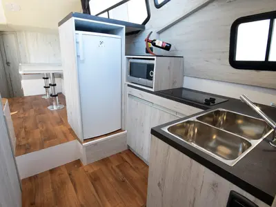 Galley of Houseboat Holidays Italia S.R.L. Minuetto 8, a motor yacht at Casier, Italy