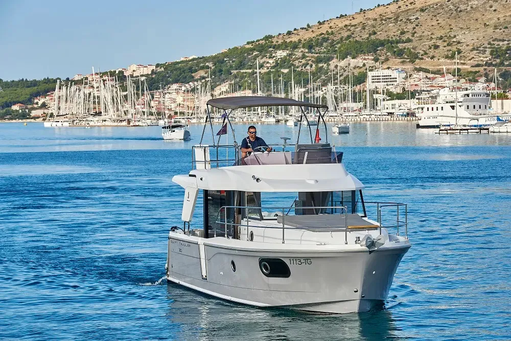 Exterior view of Odysseus, a Beneteau Swift Trawler 30 motorboat at Grad Trogir, Croatia