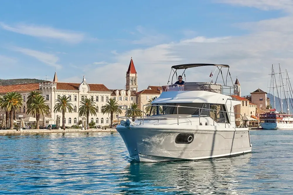 Exterior view of Odysseus, a Beneteau Swift Trawler 30 motorboat at Grad Trogir, Croatia