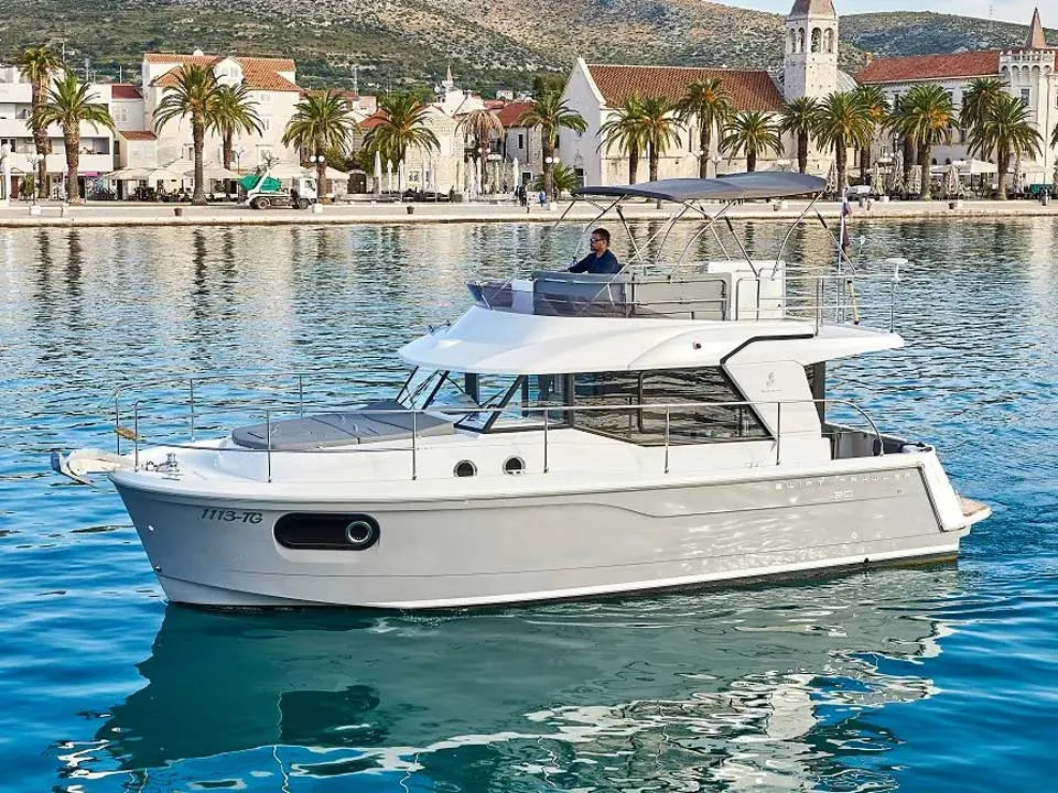 Exterior view of Odysseus, a Beneteau Swift Trawler 30 motorboat at Grad Trogir, Croatia