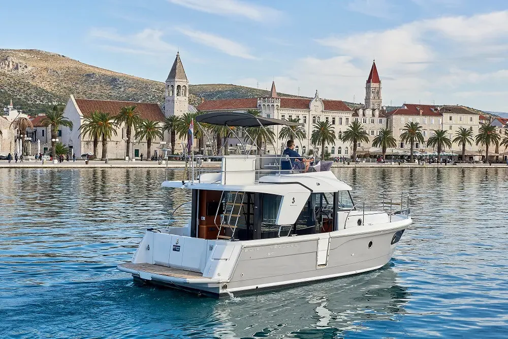 Exterior view of Odysseus, a Beneteau Swift Trawler 30 motorboat at Grad Trogir, Croatia