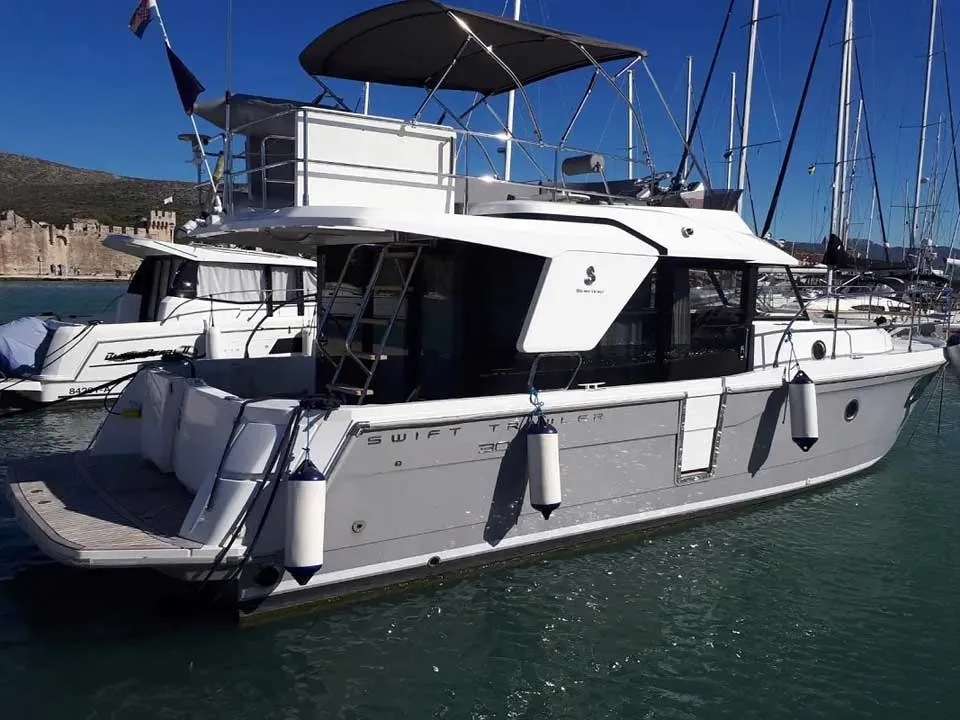 Exterior view of Odysseus, a Beneteau Swift Trawler 30 motorboat at Grad Trogir, Croatia