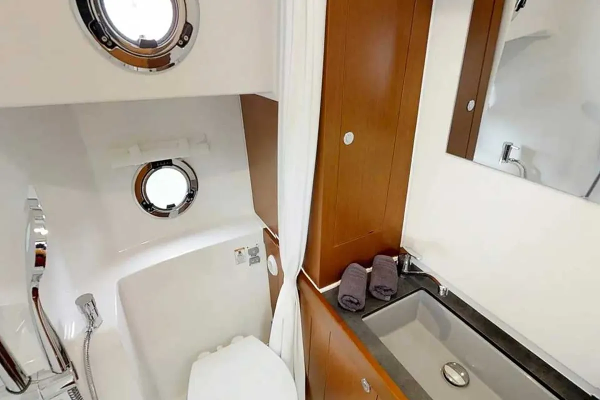 Head on Odysseus, a Beneteau Swift Trawler 30 motorboat at Grad Trogir, Croatia