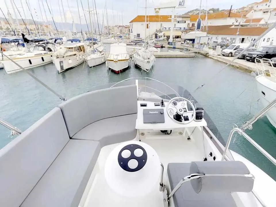 Cockpit of Odysseus, a Beneteau Swift Trawler 30 motorboat at Grad Trogir, Croatia