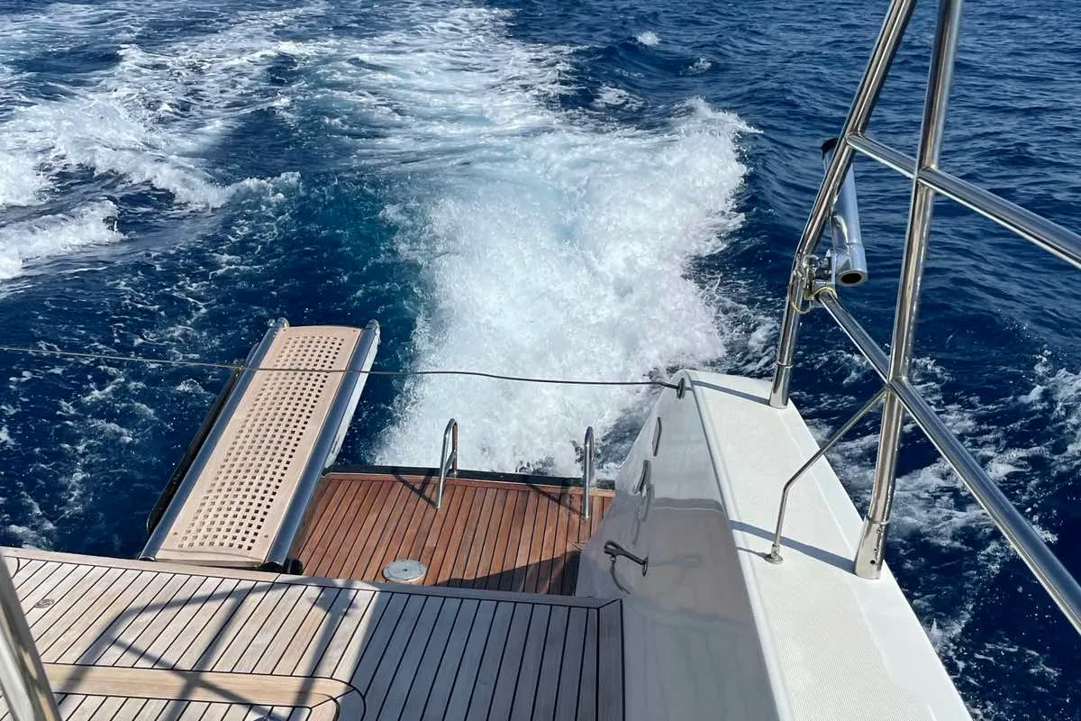 Exterior view of Pearly Gates, a Lagoon Power 630 catamaran at Mykonos, Greece