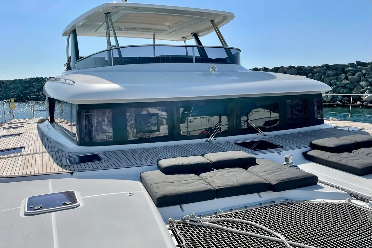Exterior view of Pearly Gates, a Lagoon Power 630 catamaran at Mykonos, Greece