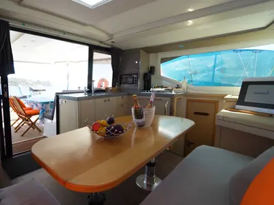 Salon of Enéa, a Fountaine Pajot Lucia 40 catamaran at Rangiroa