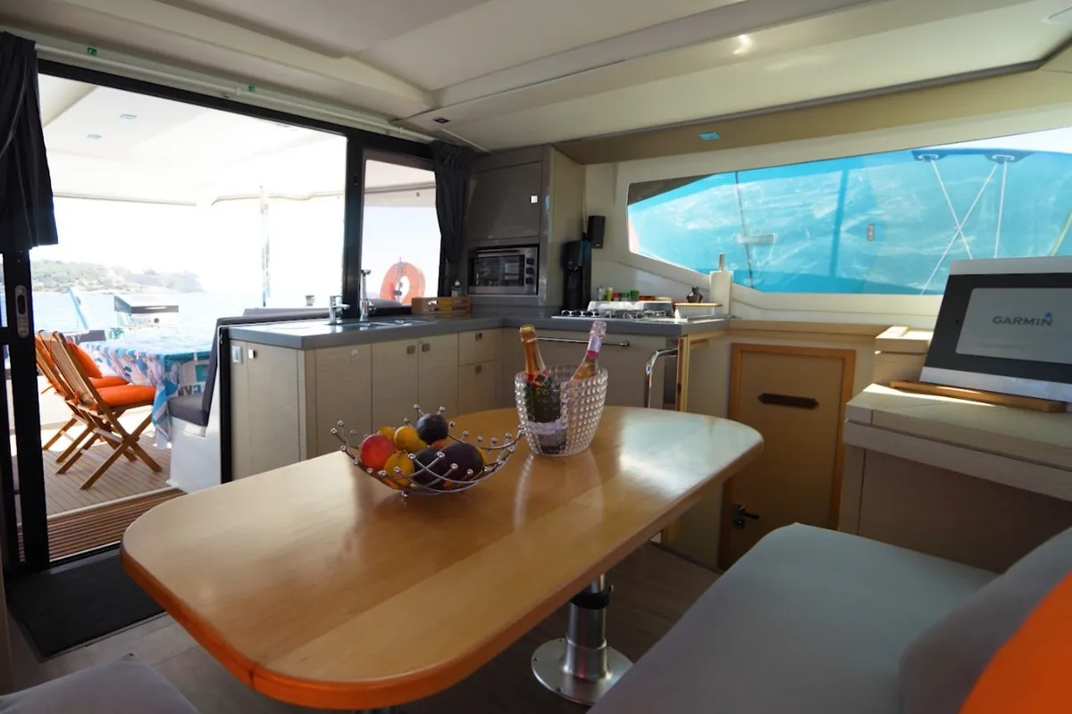 Salon of Enéa, a Fountaine Pajot Lucia 40 catamaran at Rangiroa