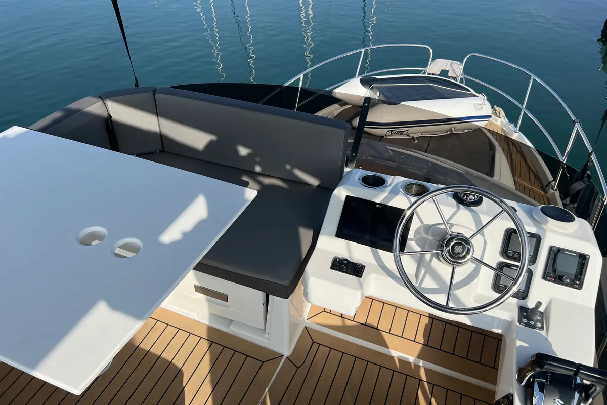 Cockpit of Jean, a Beneteau Antares 11 Fly OB motorboat at Punat, Croatia