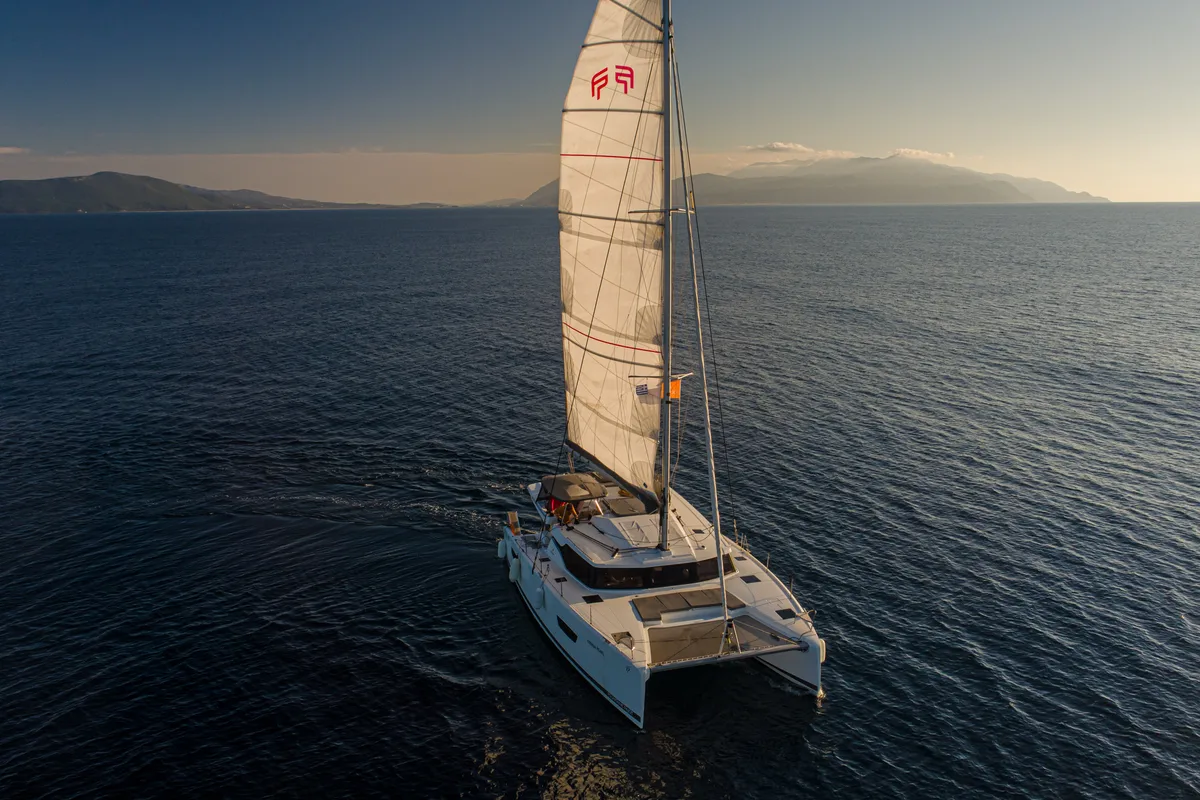 Exterior view of Nireas, a Fountaine Pajot Elba 45 catamaran at Agios Stefanos, Greece