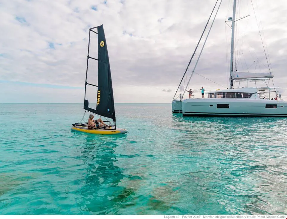 Exterior view of HeyBlue, a Lagoon 42 catamaran at Parikia, Greece