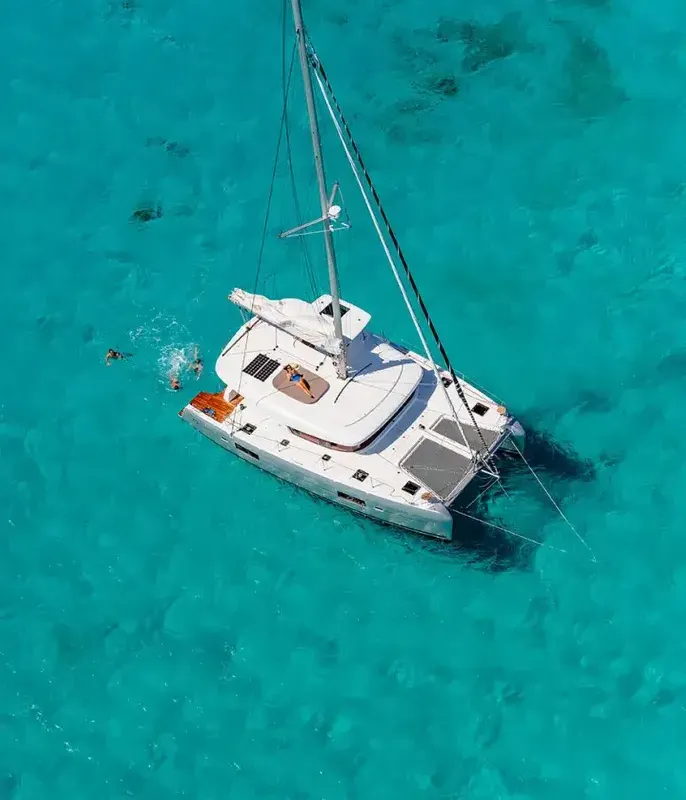 Exterior view of HeyBlue, a Lagoon 42 catamaran at Parikia, Greece