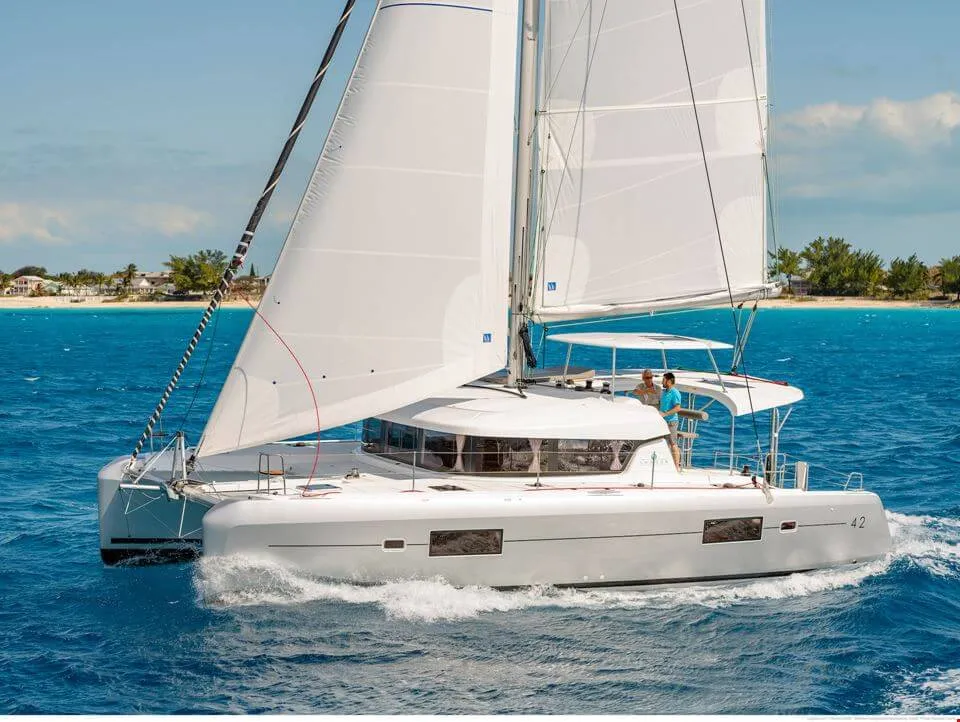 Exterior view of HeyBlue, a Lagoon 42 catamaran at Parikia, Greece