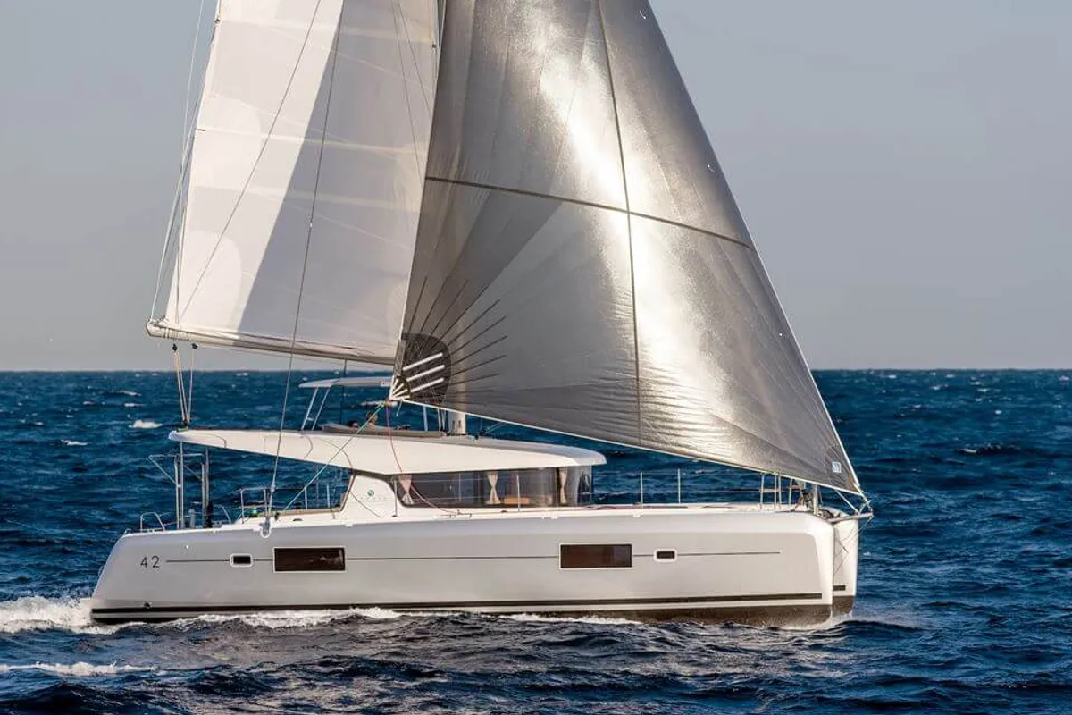 Exterior view of HeyBlue, a Lagoon 42 catamaran at Parikia, Greece