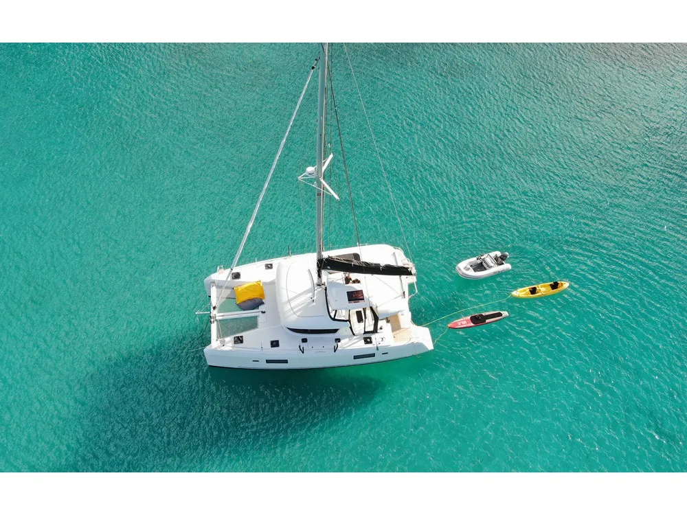Exterior view of HeyBlue, a Lagoon 42 catamaran at Parikia, Greece