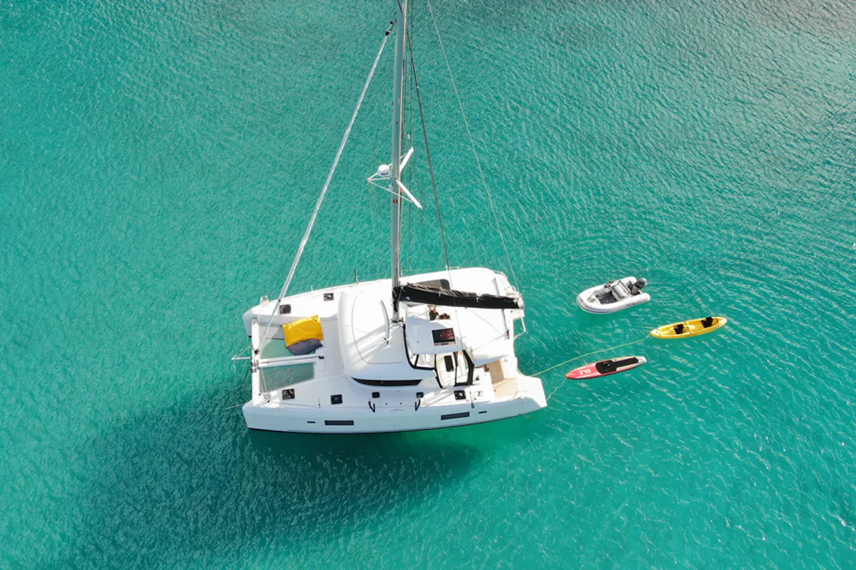 Exterior view of HeyBlue, a Lagoon 42 catamaran at Parikia, Greece