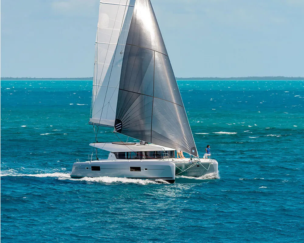 Exterior view of HeyBlue, a Lagoon 42 catamaran at Parikia, Greece