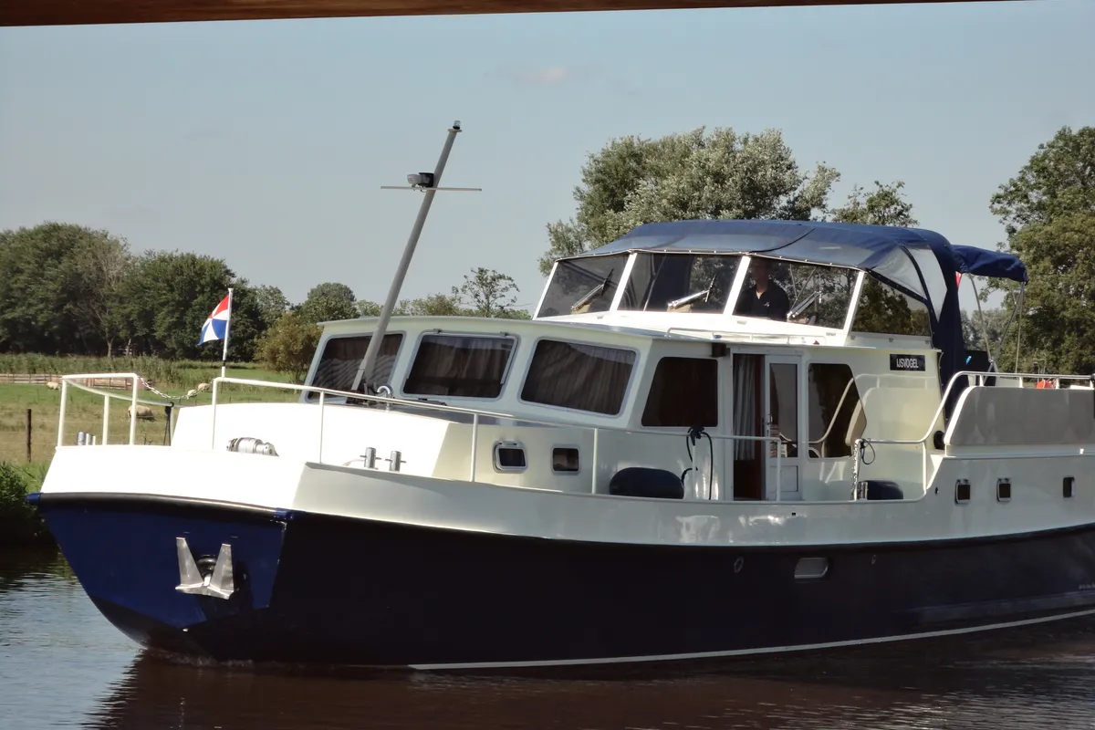 Exterior view of IJsvogel, a Delos 1430 motorboat at IJsselstein, Netherlands