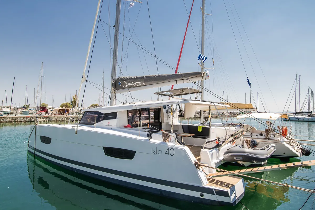 Exterior view of Aifos, a Fountaine Pajot Isla 40 catamaran at Lavreotiki, Greece