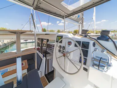 Cockpit of Aifos, a Fountaine Pajot Isla 40 catamaran at Lavreotiki, Greece