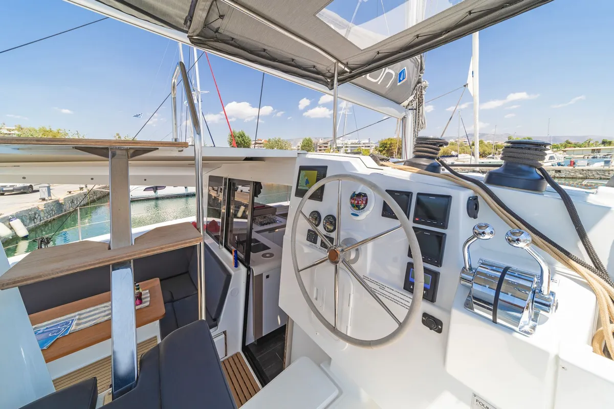 Cockpit of Aifos, a Fountaine Pajot Isla 40 catamaran at Lavreotiki, Greece