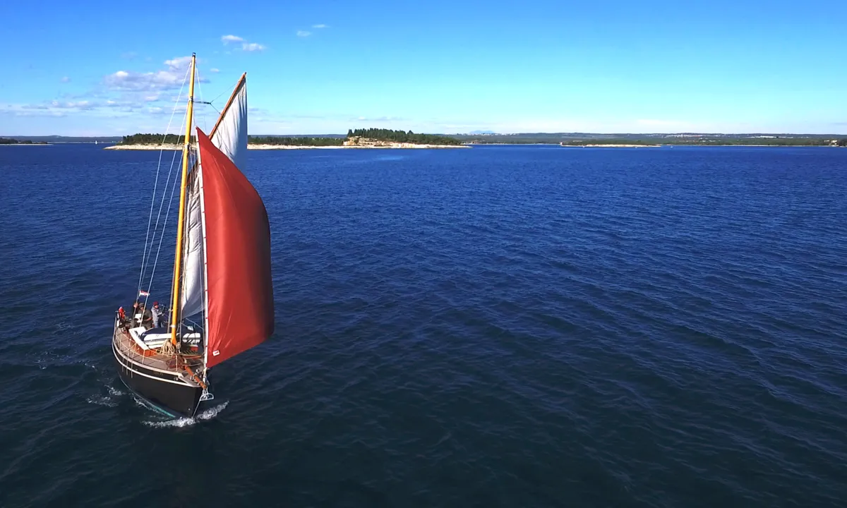 Exterior view of Black Bird, a Unknown Pilot Cutter sailboat at Pula, Croatia