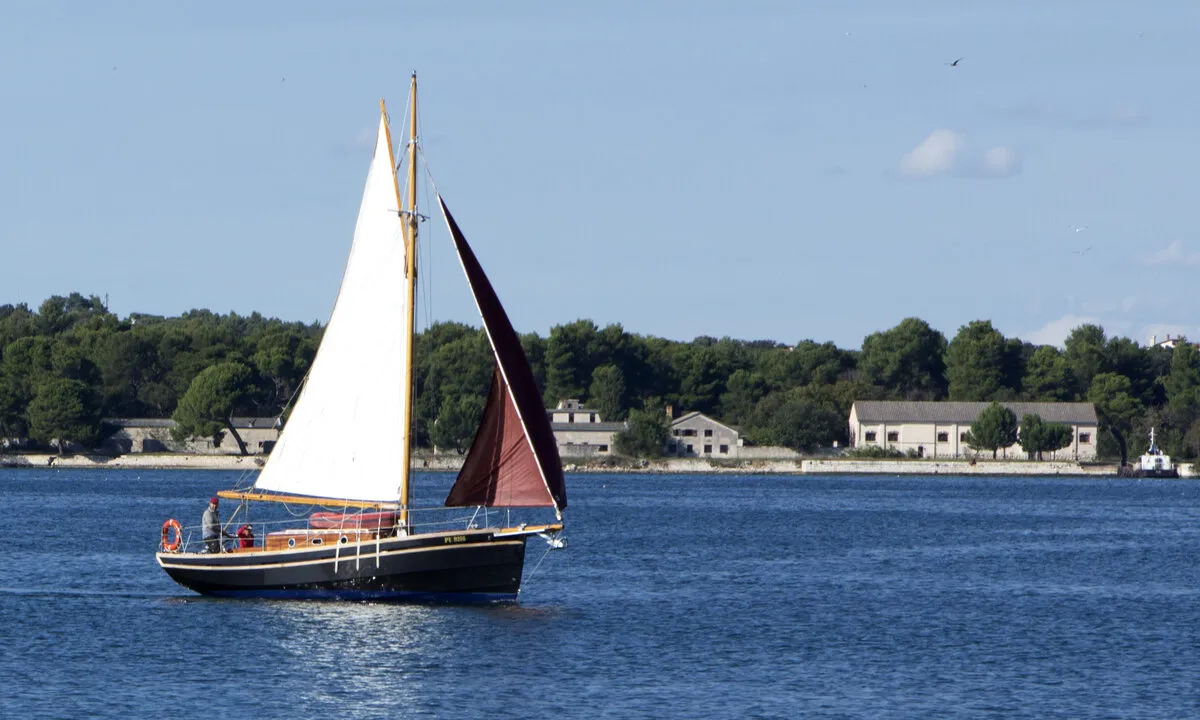 Exterior view of Black Bird, a Unknown Pilot Cutter sailboat at Pula, Croatia