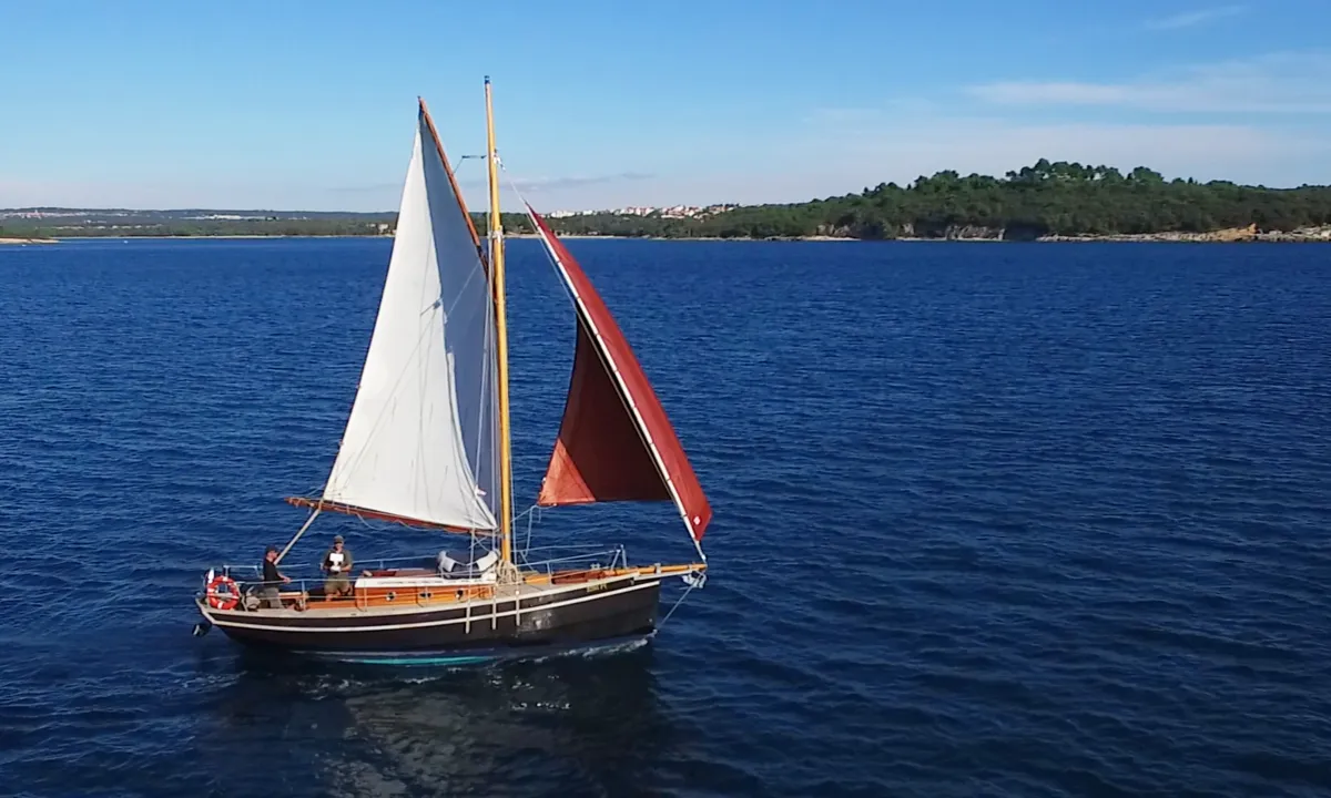 Exterior view of Black Bird, a Unknown Pilot Cutter sailboat at Pula, Croatia