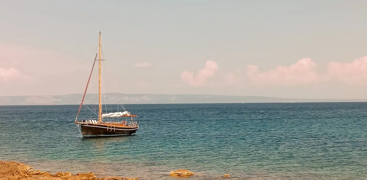 Exterior view of Black Bird, a Unknown Pilot Cutter sailboat at Pula, Croatia