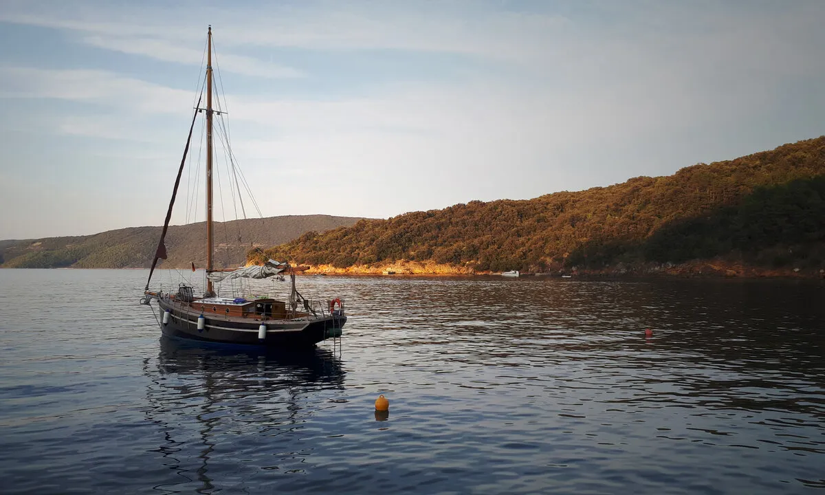 Exterior view of Black Bird, a Unknown Pilot Cutter sailboat at Pula, Croatia