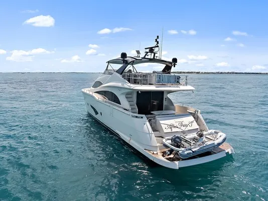 Exterior view of After Parr T, a Marquis 720 Flybridge motor yacht at Stock Island, United States
