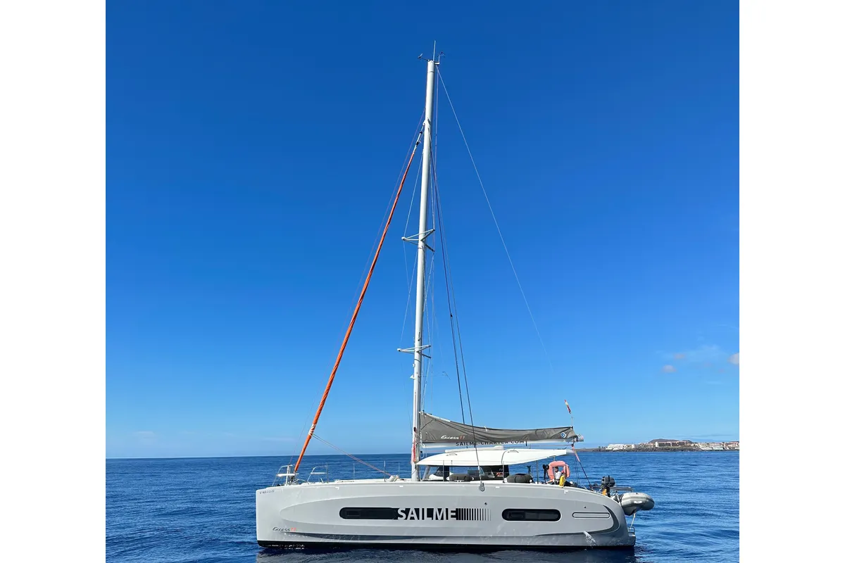 Exterior view of Saona, a Excess 11 catamaran at Ibiza, Spain