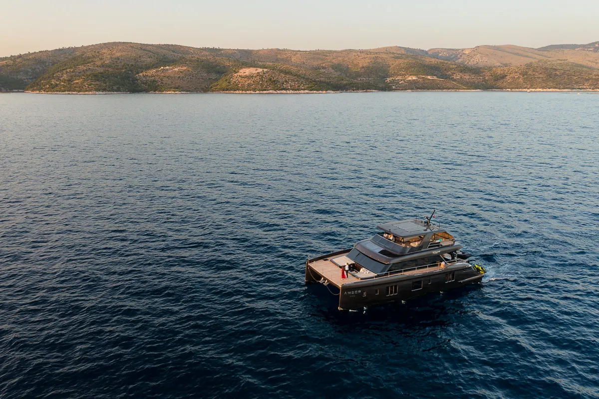 Exterior view of Amber One, a Sunreef 70 Power catamaran at Kaštela, Croatia